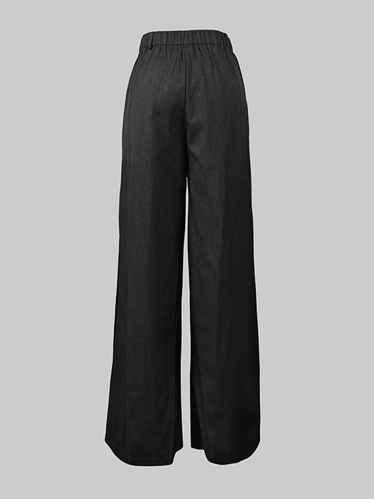 Pantalon large noir taille haute asymétrique structuré