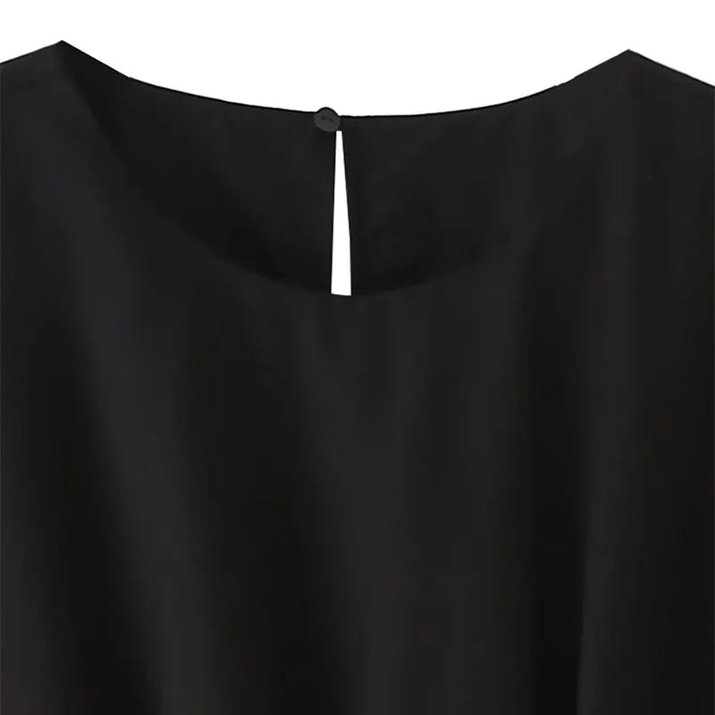 Robe midi noire à épaules structurées
