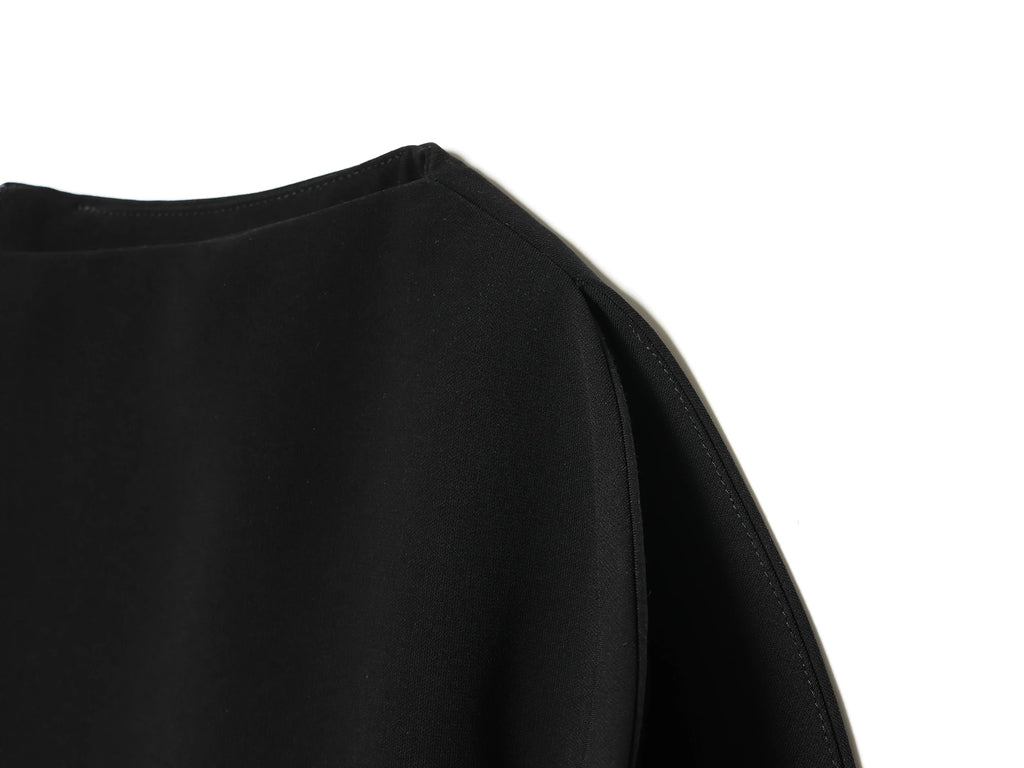 Blouse asymétrique à manches bouffantes