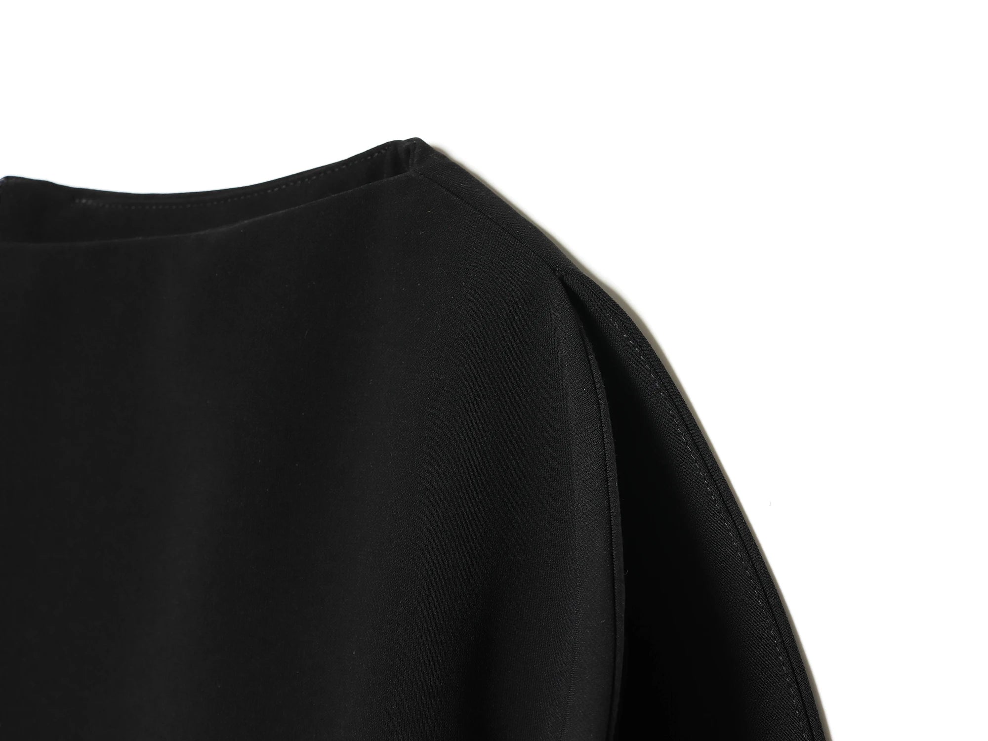 Blouse asymétrique à manches bouffantes