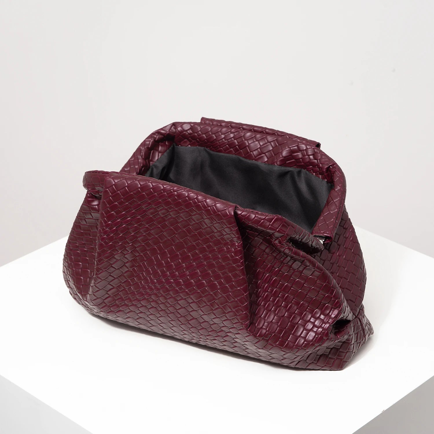 Pochette tressée bordeaux