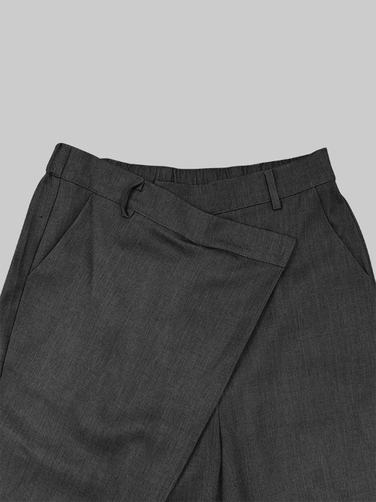 Pantalon large noir taille haute asymétrique structuré