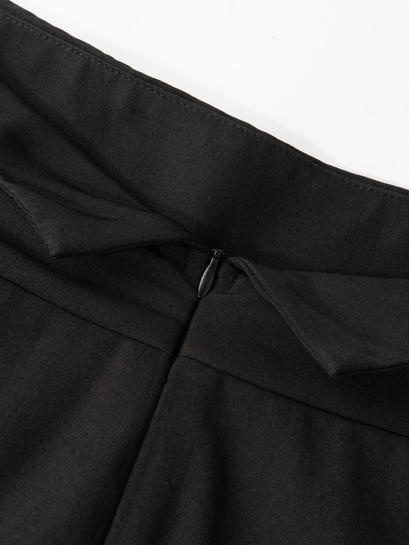 Pantalon large noir taille haute drapé élégant