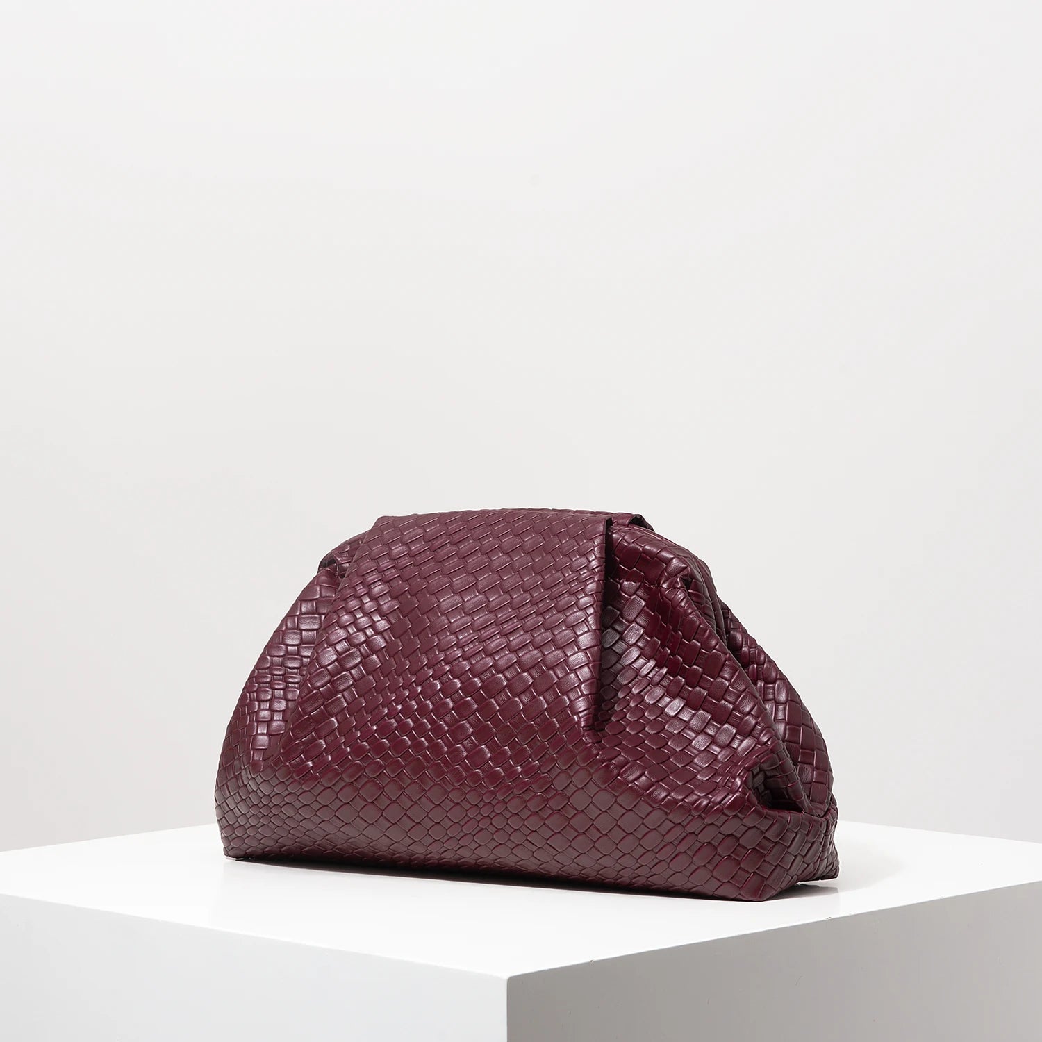 Pochette tressée bordeaux