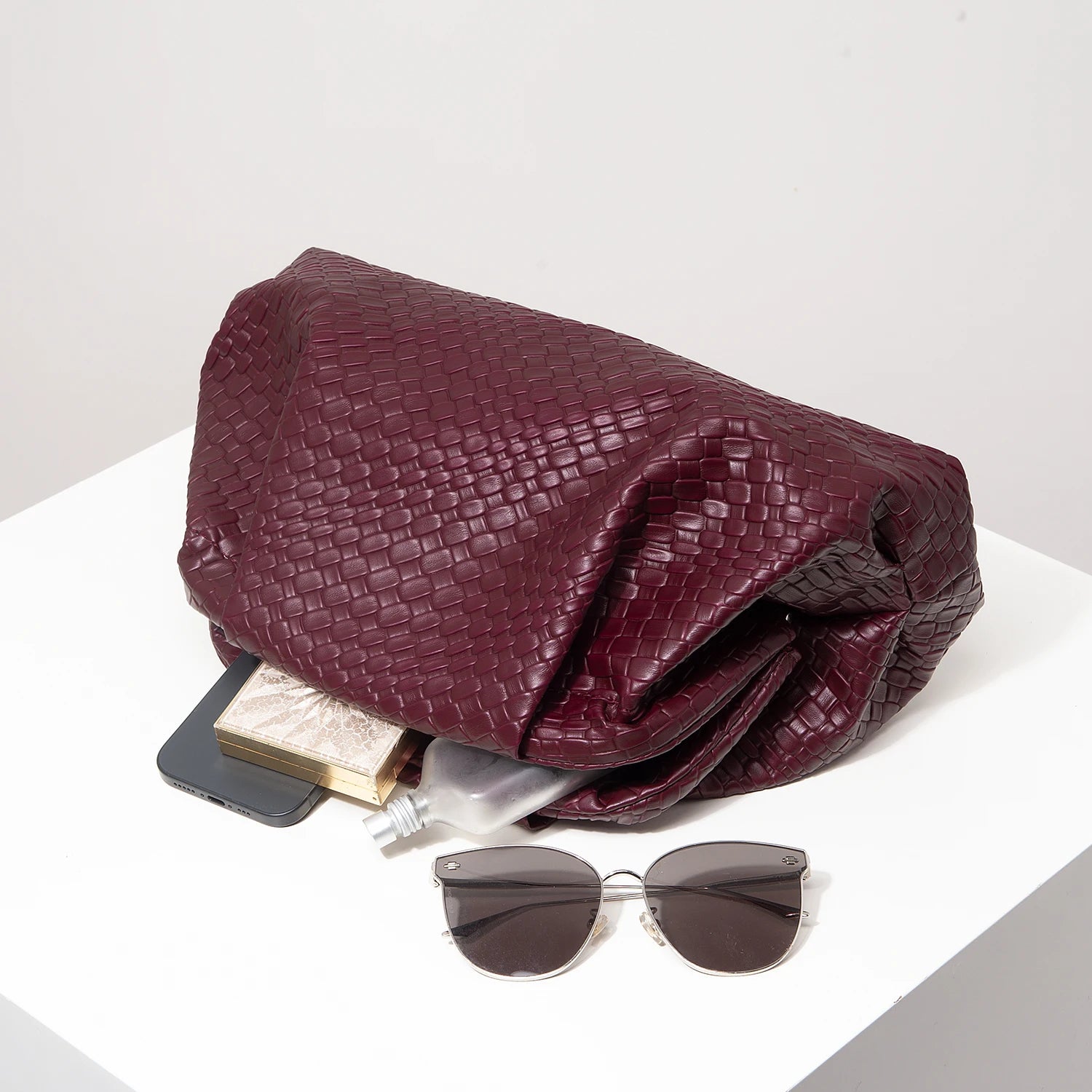 Pochette tressée bordeaux