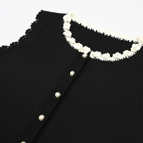 Robe longue en maille fleurie perlée
