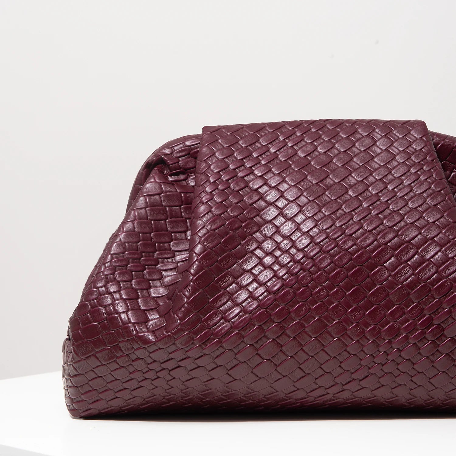 Pochette tressée bordeaux