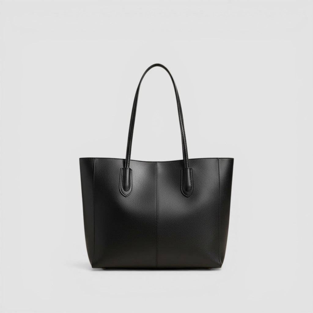 Loceor black smooth leather large tote bag with long shoulder straps and interior pocket.